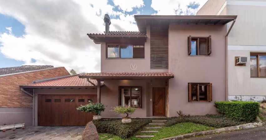 Casa em condomínio fechado com 4 quartos à venda na Avenida Vicente Monteggia, 2000, Cavalhada, Porto Alegre