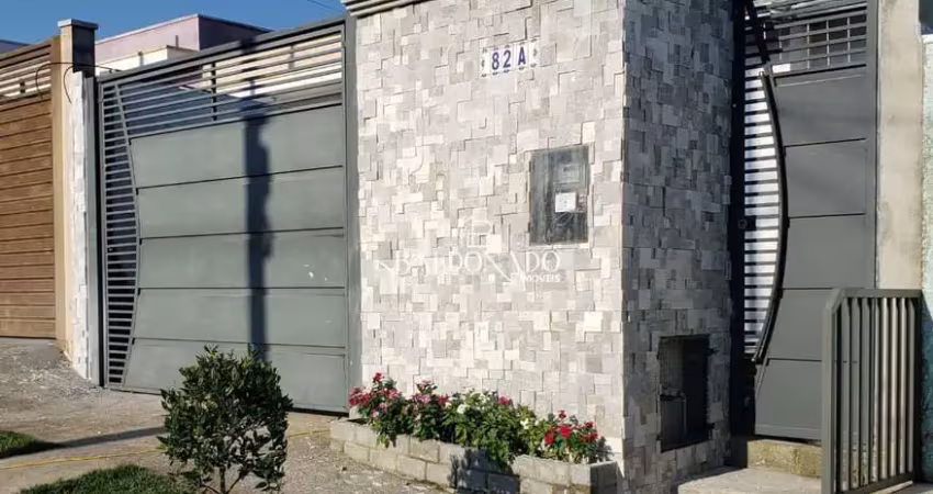 Casa em extrema mg com 2 dormitórios sendo 1 suíte 2 vagas de garagem