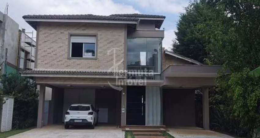 Casa para venda com 525 m², 3 suítes, lareira, sala de estar, cozinha e escritório no Condomínio Tamboré 10