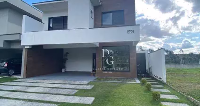 Casa com 3 dormitórios à venda, 202 m² por R$ 870.000,00 - Condomínio Vale dos Cristais - Taubaté/SP