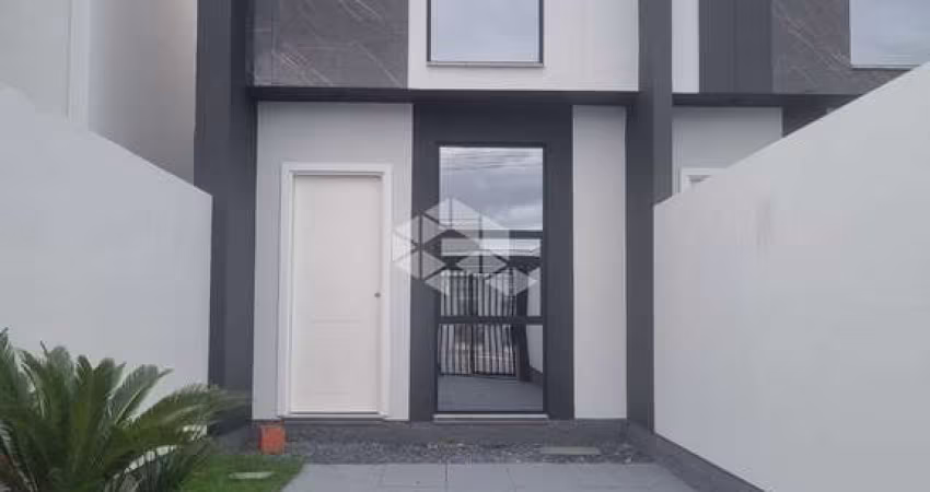 CASA SOBRADO À VENDA - 2 DORMITÓRIOS E 2 VAGAS DE GARAGEM EM TIJUCAS - SC