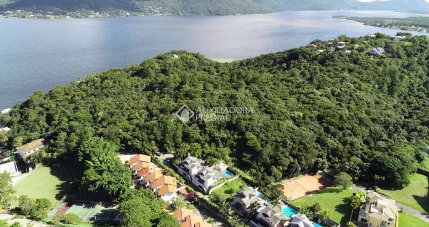 Casa em condomínio fechado com 4 quartos à venda na Rodovia Jornalista Manoel de Menezes, 2057, Barra da Lagoa, Florianópolis
