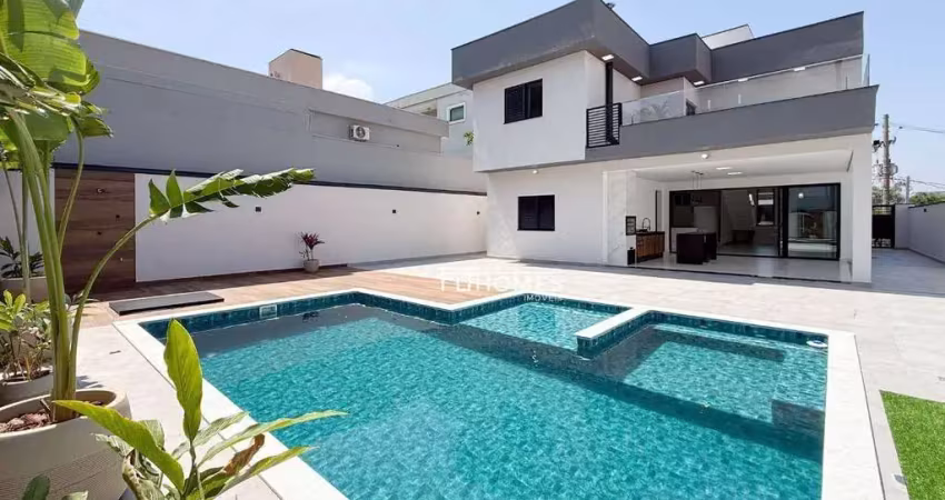 Sobrado com 3 dormitórios à venda, 328 m² por r$ 3.458.000,00 - condomínio helvetia park ii - indaiatuba/sp