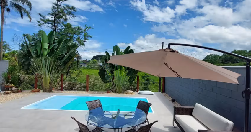 Casa de praia porteira fechada em barra velha no bairro medeiros! piscina e área gourmet completa