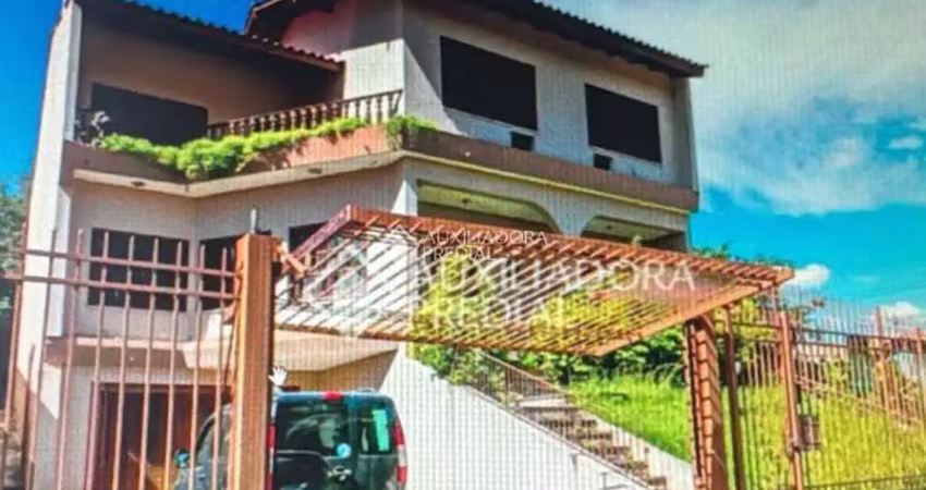 Casa em condomínio fechado com 4 quartos à venda na Avenida Jacuí, 1200, Cristal, Porto Alegre