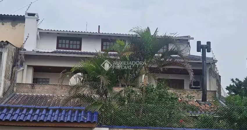 Casa com 4 quartos à venda na Charlie Chaplin, 648, Restinga, Porto Alegre