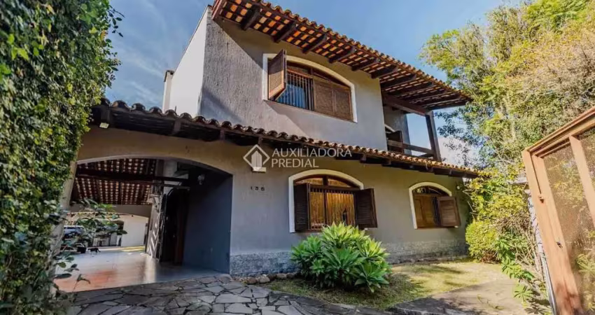 Casa com 3 quartos à venda na Rua Benjamim Moresco, 135, Ipanema, Porto Alegre