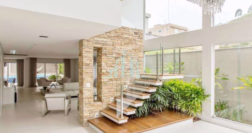 Casa com 4 dormitórios à venda, 667 m² por R$ 6.899.000,00 - Alphaville/SP