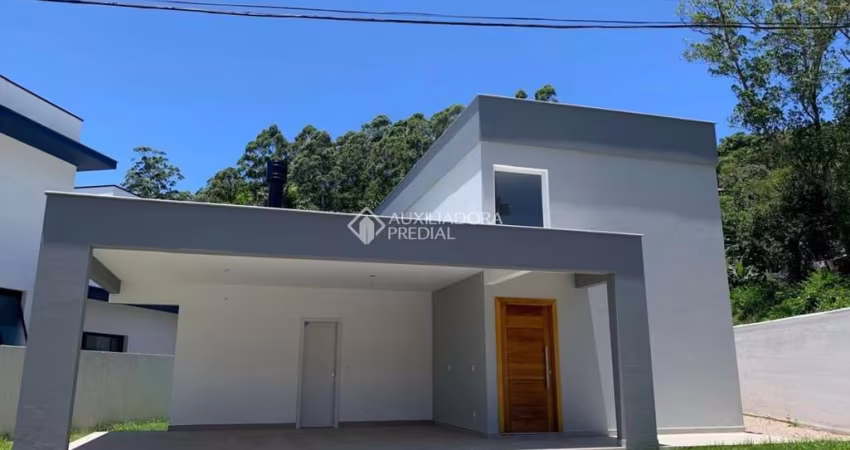Casa em condomínio fechado com 3 quartos para alugar na Rua Leonel Pereira, 2239, Cachoeira do Bom Jesus, Florianópolis