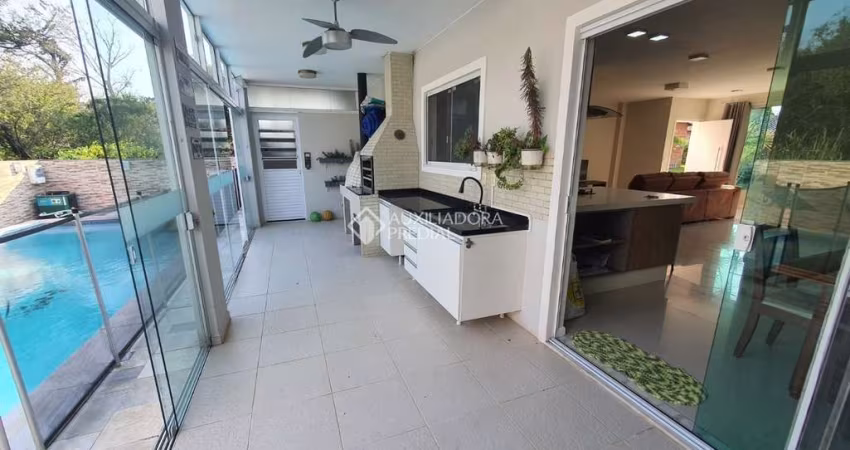 Casa em condomínio fechado com 4 quartos para alugar na Avenida Luiz Boiteux Piazza, 4256, Cachoeira do Bom Jesus, Florianópolis