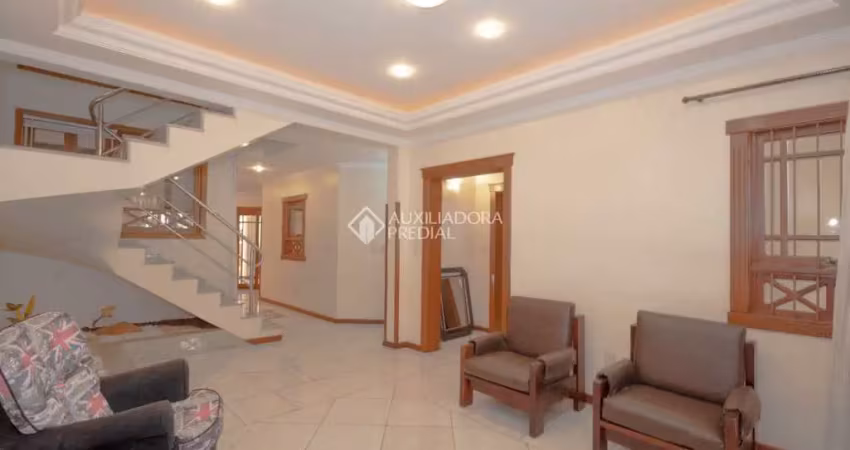 Casa com 4 quartos para alugar na Rua das Bromélias, 240, Estância Velha, Canoas
