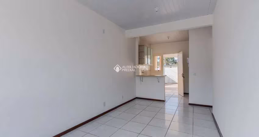 Casa em condomínio fechado com 2 quartos para alugar na Rua Santa Júlia, 56, Olaria, Canoas