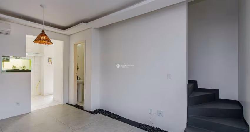 Casa em condomínio fechado com 2 quartos para alugar na Rua dos Guaramirins, 303, Igara, Canoas