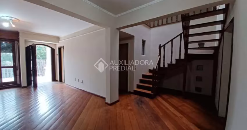 Casa com 4 quartos para alugar na Rua Tietê, 375, Igara, Canoas