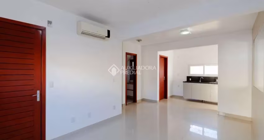 Casa em condomínio fechado com 3 quartos para alugar na Rua República, 2708, Harmonia, Canoas