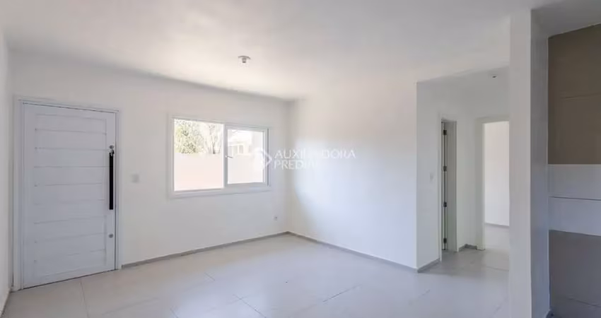 Casa em condomínio fechado com 2 quartos para alugar na Rua Pandiá Calógeras, 1412, Niterói, Canoas