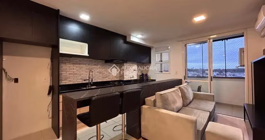 Apartamento com 2 quartos para alugar na Carlos Alberto Lauermann Nunes, 290, Olaria, Canoas