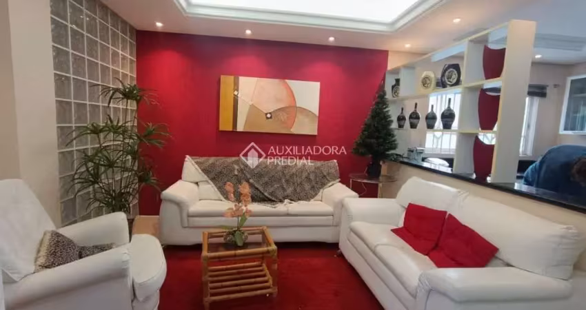 Casa com 4 quartos para alugar na Rua Luís Maurício Scolari, 423, Igara, Canoas