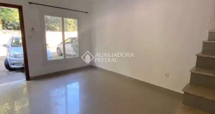Casa em condomínio fechado com 3 quartos para alugar na Rua Júlio Dias de Souza, 175, Aberta dos Morros, Porto Alegre
