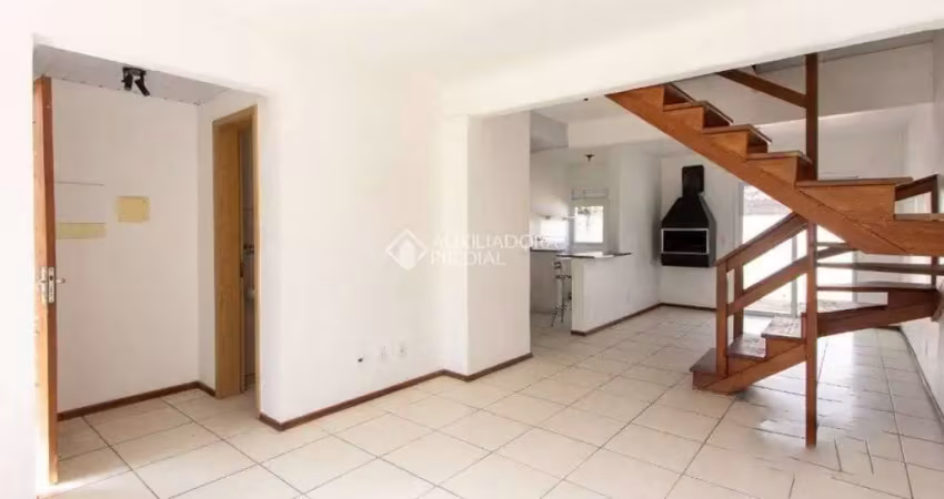 Casa em condomínio fechado com 3 quartos para alugar na Avenida Edgar Pires de Castro, 2520, Hípica, Porto Alegre