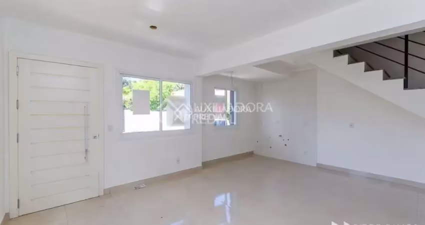 Casa em condomínio fechado com 3 quartos para alugar na Rua Helio Felix Frey, 114, Espírito Santo, Porto Alegre
