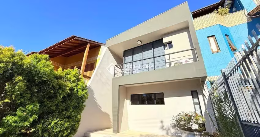 Casa em condomínio fechado com 3 quartos para alugar na Avenida Altos do Santa Rita, 330, Aberta dos Morros, Porto Alegre
