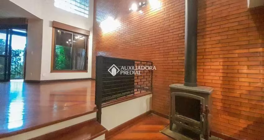 Casa em condomínio fechado com 3 quartos para alugar na Avenida Jacuí, 978, Cristal, Porto Alegre