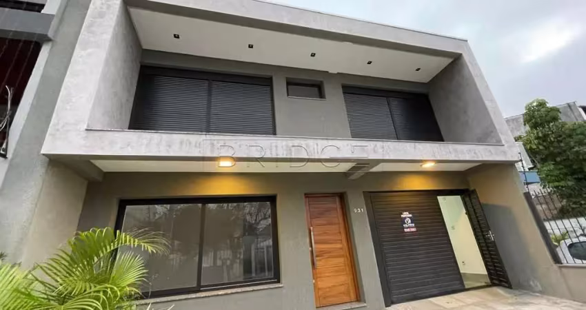 Casa em condomínio fechado com 3 quartos para alugar na Rua Buarque de Macedo, 931, São Geraldo, Porto Alegre