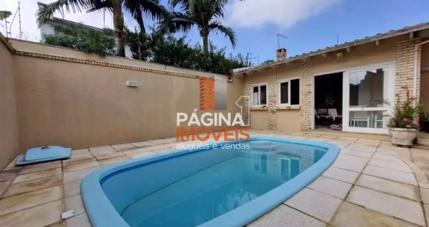 Página 1 Imóveis anuncia excelente casa/sobrado com piscina e 05 dormitórios, sendo 03 suítes, bairro Moinhos de Vento em Canoas/RS. - CA224