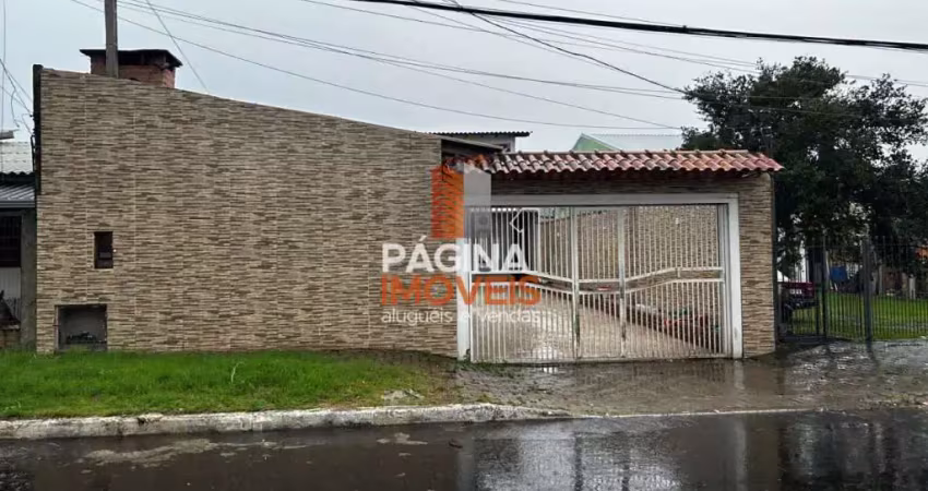 Página 1 Imóveis anuncia venda de casa com piscina e 4 dormitórios, sendo 1 suíte, no Bairro Harmonia em Canoas/RS. - CA216