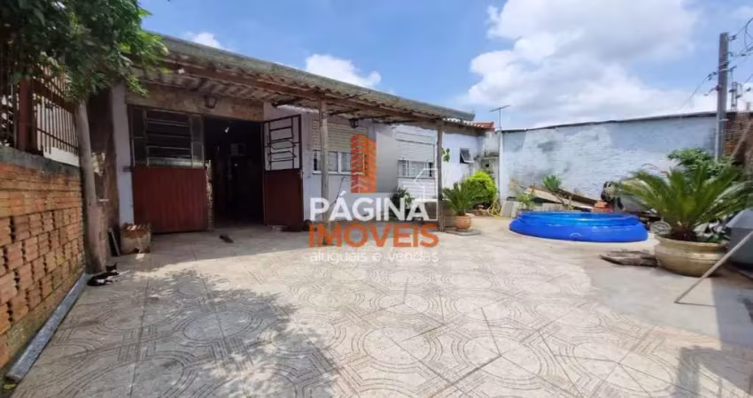 Página 1 Imóveis anuncia ótima oportunidade de casa para venda de 03 dormitórios, sendo 2 suítes, no Bairro Guajuviras em Canoas/RS. - CA168