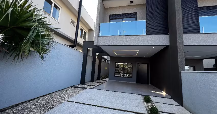 Casa mobiliada de estilo moderno à venda na praia dos ingleses, com 3 dormitório/01suíte