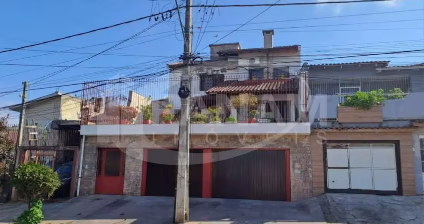 Casa com 4 quartos à venda na Rua Arnaldo Ballve, 709, Jardim Itu Sabará, Porto Alegre