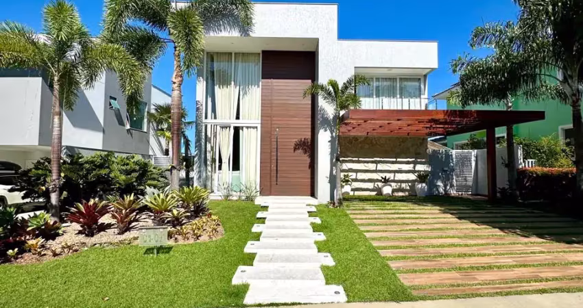 Alphaville litoral norte 1 | casa 306m² com 4 suítes | moderna | piscina | área gourmet | energia solar