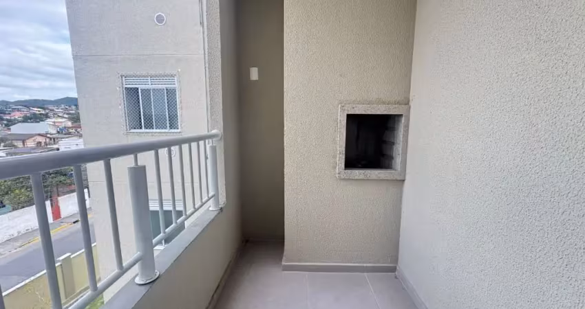 Apartamento 02 dormitórios e sacada com churrasqueira em biguaçu