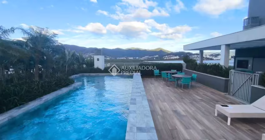 Apartamento com 3 quartos para alugar na Rodovia Haroldo Soares Glavan, 795, Cacupé, Florianópolis