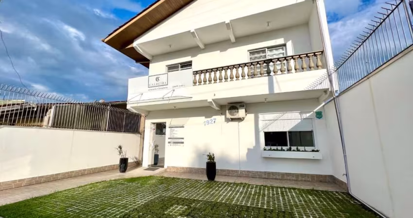 Casa com 4 dormitórios à venda, 294 m² por R$ 1.180.000,00 - Centro - Guaratuba/PR