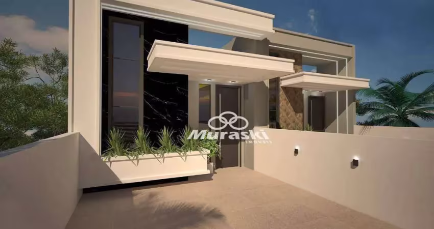 Casa com 3 dormitórios à venda, 131 m² por R$ 880.000 - Brejatuba - Guaratuba/PR
