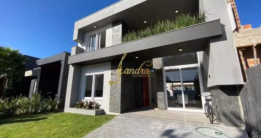 Excelente sobrado em condomínio com 04 suítes  beira lago