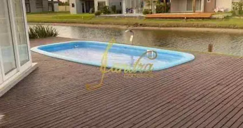 Lindo sobrrado com 05 suítes beira de lago