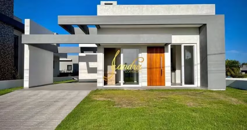 Casa térrea com três suítes em condomínio fechado com mobília fixa