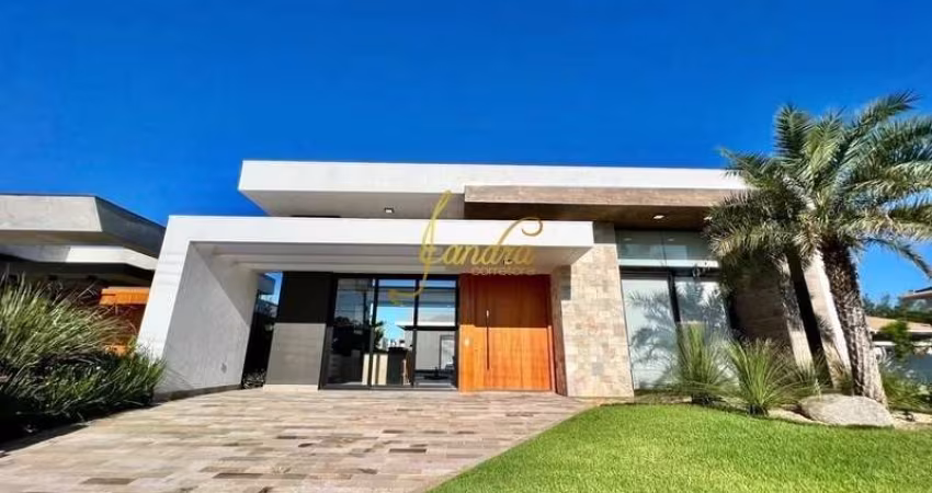 Casa térrea em condomínio fechado com 04 suites mobiliada e decorada