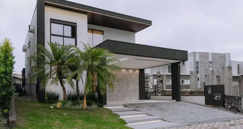 Casa com piscina à venda, 3 quartos sendo 3 suítes, 4 vagas, cond. açores, bairro dom bosco, itajaí-sc