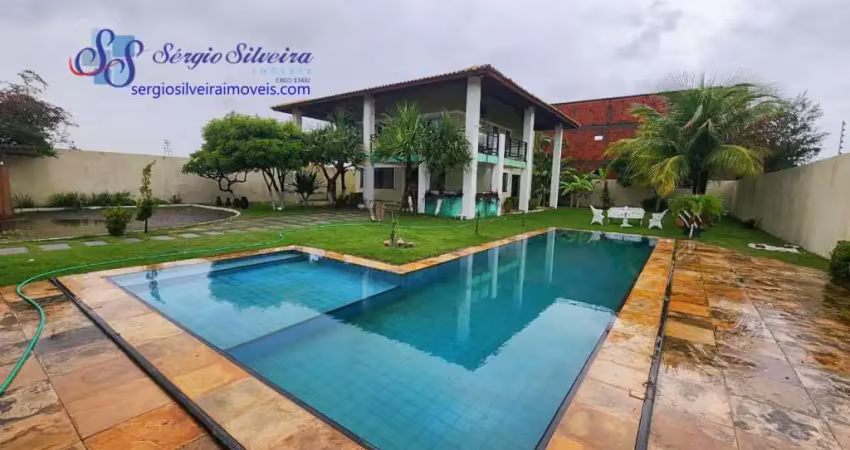 Casa vista mar no Porto das Dunas com 3 suítes