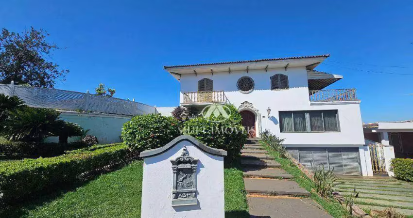 Casa de Alto Padrão Residencial/Comercial localizada no Bairro Ribeirânia, terreno de 1703m² e 862,73m² de área construída, 6 suítes.
