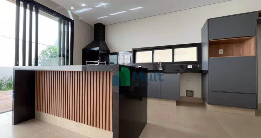 Próximo ao espaço de lazer, casa térrea com 4 suítes completa.