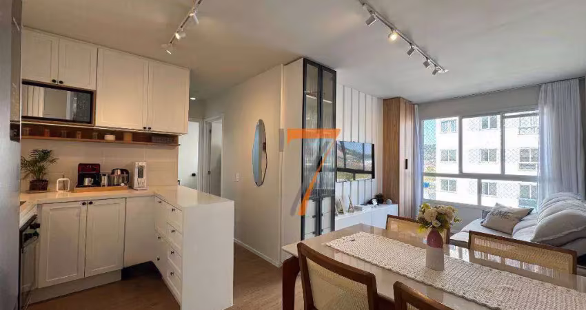 Apartamento semimobiliado 2 dormitórios (1 suíte) - em condomínio clube - por r$370.000 - rio caveiras - biguaçu/sc