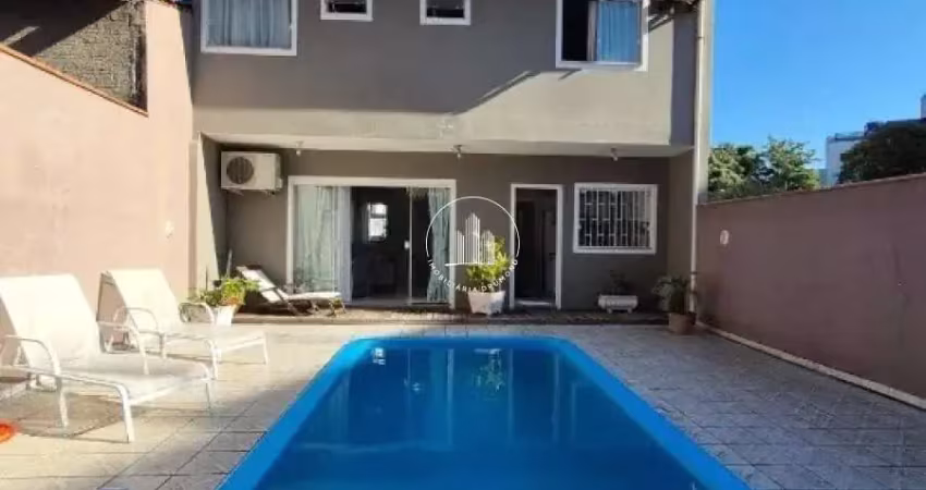 Casa com 3 quartos à venda na Rua Wilson Luz, 45, Coqueiros, Florianópolis