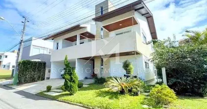 Casa à venda no campeche, florianópolis, em condomínio com 5 suítes e lazer completo