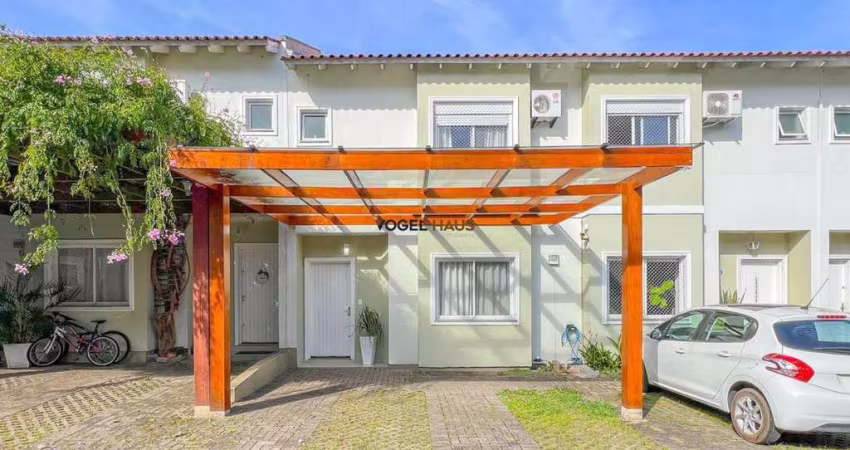 Residencial Medianeira II: Sobrado em Condomínio à venda em Canoas - Área de serviço e churrasqueira
